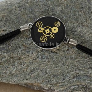 Bracelet en cordon, fermoir métal avec éléments mécaniques de montre