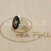 Bague argentée et partie centrale avec éléments d'horlogerie