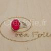 Bague argentée et partie centrale rose et blanche