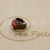 Bague couleur bronze et décoration rouge blanc en résine